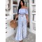 12902 Σετ εμπριμέ παντελόνα με τοπ έξωμο Γαλάζιο